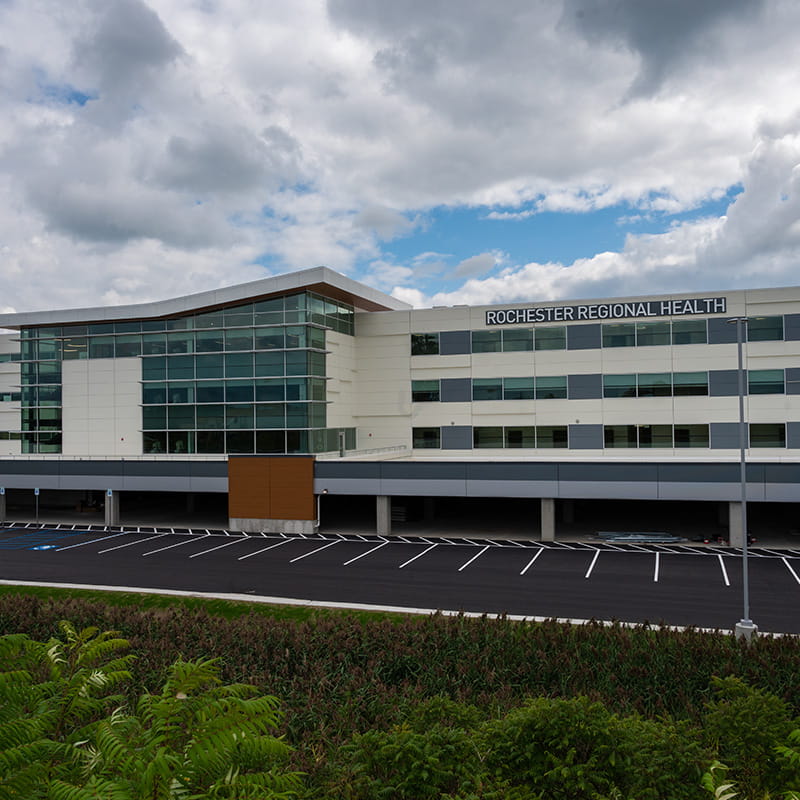 exterior of hospital with cloudy skies